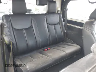 2013 Jeep Wrangler Rubicon 10th Anniversary with VIN 1C4BJWCG8DL639121, listed as a IAAI auction lot 40561773 with 56,023 mi miles and . Bid and sale history available at DreamBid. Image 8.