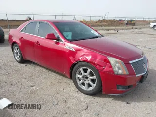 2009 Cadillac CTS RWD w/1SA with VIN 1G6DF577490135353, listed as a IAAI auction lot 41724476 with 128,062 mi miles. Bid and sale history available at carsss.com. Image 1.