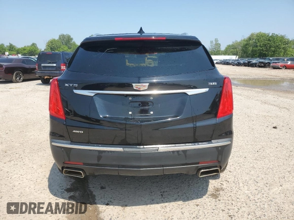 2019 Cadillac XT5 Premium Luxury AWD with VIN 1GYKNFRS9KZ232297, listed as a Copart auction lot 60241095 with 88,955 mi miles and Salvage title. Bid and sale history available at DreamBid. Image 6.