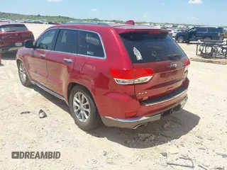 2014 Jeep Grand Cherokee Summit with VIN 1C4RJFJT1EC237358, listed as a IAAI auction lot 42602245 with 106,821 mi miles and . Bid and sale history available at DreamBid. Image 3.