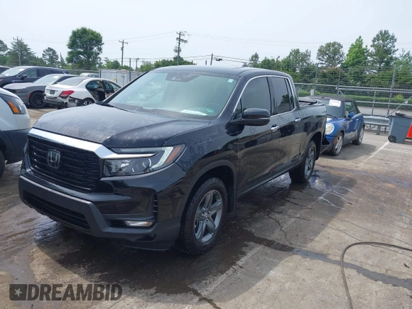 2023 Honda Ridgeline RTL-E with VIN 5FPYK3F76PB042100, listed as a IAAI auction lot 42274861 with 16,822 mi miles and . Bid and sale history available at DreamBid. Image 18.