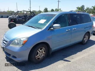 2005 Honda Odyssey EX-L with VIN 5FNRL38785B110823, listed as a IAAI auction lot 42154177 with 195,298 mi miles. Bid and sale history available at carsss.com. Image 2.