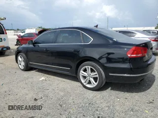 2014 Volkswagen Passat SE with VIN 1VWBN7A35EC094262, listed as a Copart auction lot 60287965 with 71,081 mi miles and Salvage title. Bid and sale history available at DreamBid. Image 2.