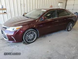 2016 Toyota Avalon Limited z VIN 4T1BK1EB1GU221382, wystawiony jako Copart lot #51970145 z przebiegiem 156 288 mil mil oraz Czysty tytuł • Clean title. Historia ofert i sprzedaży dostępna na DreamBid. Obrazek 1.
