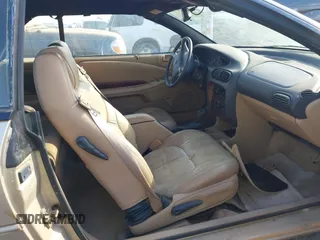 1999 Chrysler Sebring JXi z VIN 3C3EL55H0XT603685, wystawiony jako IAAI lot #42325316 z przebiegiem Nie podano mil oraz . Historia ofert i sprzedaży dostępna na DreamBid. Obrazek 5.