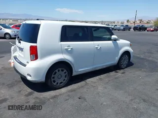 2014 Scion xB with VIN JTLZE4FE8EJ060455, listed as a IAAI auction lot 42114398 with 1 mi miles. Bid and sale history available at carsss.com. Image 4.