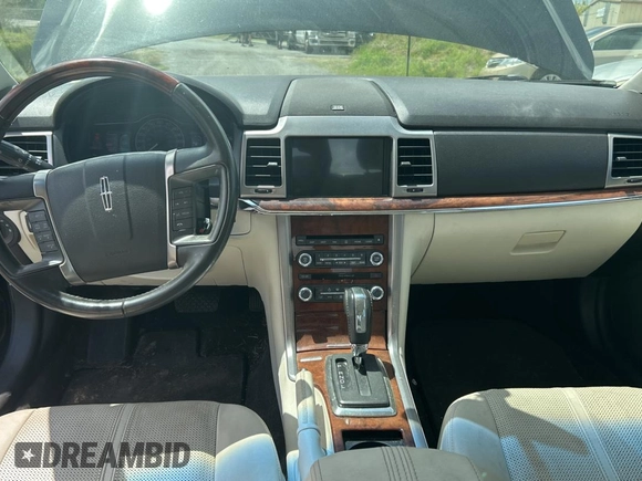 2011 Lincoln MKZ Hybrid with VIN 3LNDL2L33BR759329, listed as a Copart auction lot 51872235 with 131,927 mi miles and Clean Title. Bid and sale history available at carsss.com. Image 9.