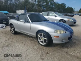 2003 Mazda MX-5 Miata Cloth with VIN JM1NB353430304103, listed as a Copart auction lot 50574245 with Not provided miles and Salvage title. Bid and sale history available at DreamBid. Image 4.