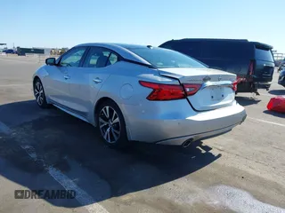 2016 Nissan Maxima SL z VIN 1N4AA6AP3GC377081, wystawiony jako IAAI lot #42235817 z przebiegiem 159 571 mil mil oraz . Historia ofert i sprzedaży dostępna na DreamBid. Obrazek 3.