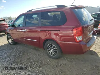 2011 Kia Sedona EX with VIN KNDMH4C72B6374068, listed as a Copart auction lot 79109454 with 104,860 mi miles and Salvage Title. Bid and sale history available at carsss.com. Image 2.