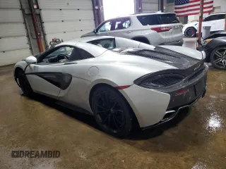 2018 McLaren 570S z VIN SBM13FAA2JW004594, wystawiony jako Copart lot #49730155 z przebiegiem Nie podano mil oraz Szkody całkowita. Historia ofert i sprzedaży dostępna na DreamBid. Obrazek 2.