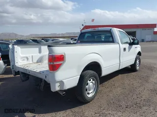 2014 Ford F-150 XL with VIN 1FTMF1CM4EKE98669, listed as a IAAI auction lot 41310314 with 133,239 mi miles. Bid and sale history available at carsss.com. Image 4.