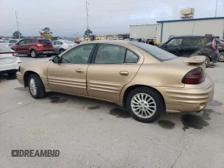1999 Pontiac Grand Am SE2 with VIN 1G2NE52T2XM869508, listed as a Copart auction lot 44443755 with 119,769 mi miles and Salvage Title. Bid and sale history available at carsss.com. Image 2.