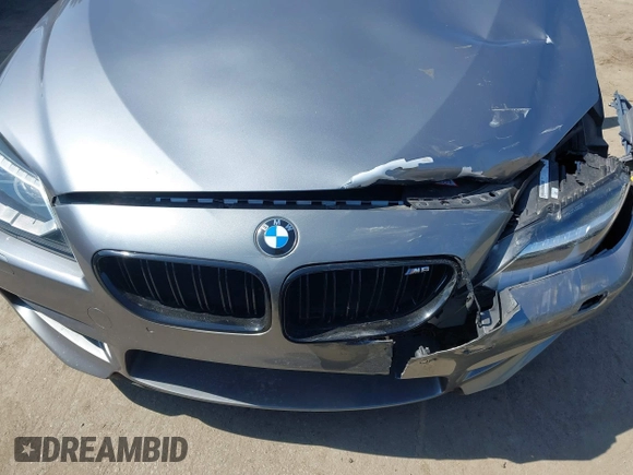 2013 BMW M6 with VIN WBSLX9C51DC968593, listed as a IAAI auction lot 42465979 with 88,010 mi miles and . Bid and sale history available at DreamBid. Image 17.