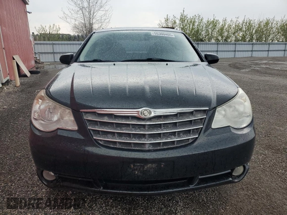 2009 Chrysler Sebring Touring z VIN 1C3LC56D69N570746, wystawiony jako Copart lot #55300405 z przebiegiem 186 391 mil mil oraz Czysty tytuł • Clean title. Historia ofert i sprzedaży dostępna na DreamBid. Obrazek 5.
