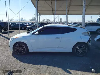 2015 Hyundai Veloster with VIN KMHTC6AD3FU227852, listed as a IAAI auction lot 41657406 with 179,185 mi miles. Bid and sale history available at carsss.com. Image 15.