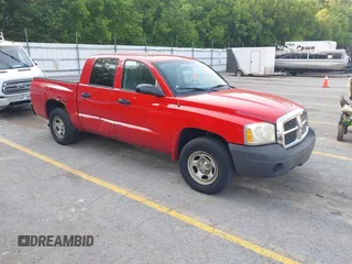 2006 Dodge Dakota ST z VIN 1D7HE28K16S505179, wystawiony jako IAAI lot #42483353 z przebiegiem 103 862 mil mil oraz . Historia ofert i sprzedaży dostępna na DreamBid. Obrazek 1.