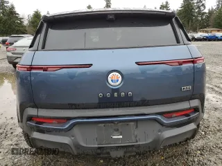 2023 Fisker Ocean One z VIN VCF1ZBU2XPG003443, wystawiony jako Copart lot #50072055 z przebiegiem 7805 mil mil oraz Szkody całkowita. Historia ofert i sprzedaży dostępna na DreamBid. Obrazek 6.