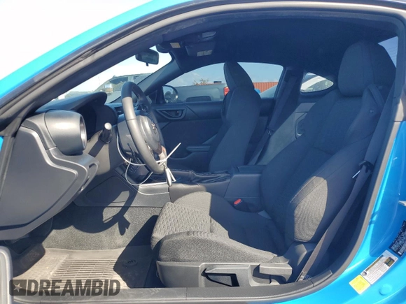 2023 Toyota GR86 with VIN JF1ZNBC11P8758861, listed as a Copart auction lot 77705634 with 11,684 mi miles and Salvage Title. Bid and sale history available at carsss.com. Image 7.