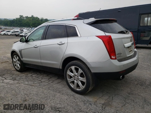 2015 Cadillac SRX Performance Collection with VIN 3GYFNFE36FS549358, listed as a Copart auction lot 59724065 with 132,045 mi miles and Salvage title. Bid and sale history available at DreamBid. Image 2.