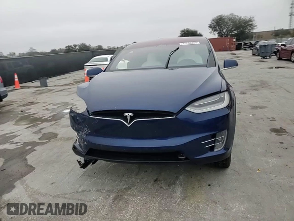 2020 Tesla Model X Long Range with VIN 5YJXCBE2XLF250234, listed as a Copart auction lot 42236365 with 63,401 mi miles and Non Repairable. Bid and sale history available at carsss.com. Image 15.