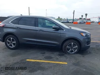 2023 Ford Edge SEL z VIN 2FMPK4J98PBA03830, wystawiony jako IAAI lot #41992054 z przebiegiem 21 081 mil mil oraz . Historia ofert i sprzedaży dostępna na DreamBid. Obrazek 13.