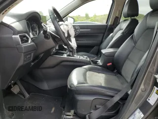 2018 Mazda CX-5 Touring z VIN JM3KFBCM2J0379190, wystawiony jako Copart lot #59233075 z przebiegiem 51 985 mil mil oraz Szkoda całkowita • Salvage title. Historia ofert i sprzedaży dostępna na DreamBid. Obrazek 7.