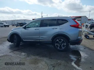 2018 Honda CR-V Touring with VIN 7FARW1H90JE012526, listed as a IAAI auction lot 42055078 with 96,098 mi miles and . Bid and sale history available at DreamBid. Image 14.