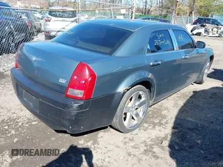 2005 Chrysler 300 with VIN 2C3JA53GX5H188833, listed as a IAAI auction lot 41906889 with 999,999 mi miles. Bid and sale history available at carsss.com. Image 4.