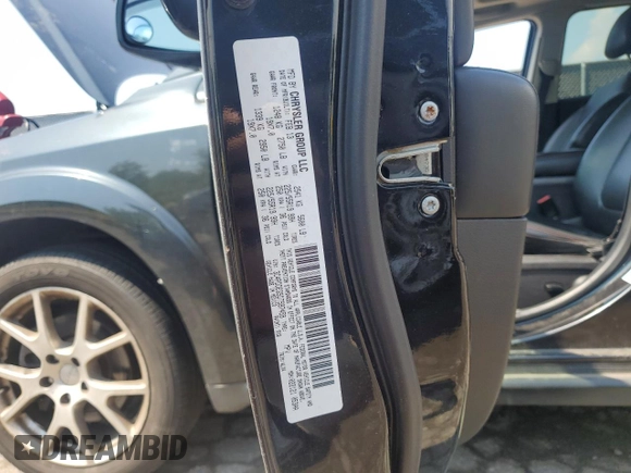 2013 Dodge Journey R/T z VIN 3C4PDDEG5DT597459, wystawiony jako Copart lot #62711755 z przebiegiem 152 498 mil mil oraz Czysty tytuł • Clean title. Historia ofert i sprzedaży dostępna na DreamBid. Obrazek 13.