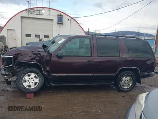 1997 GMC Yukon with VIN 1GKEK13R0VJ755574, listed as a IAAI auction lot 41158932 with 212,668 mi miles. Bid and sale history available at carsss.com. Image 15.