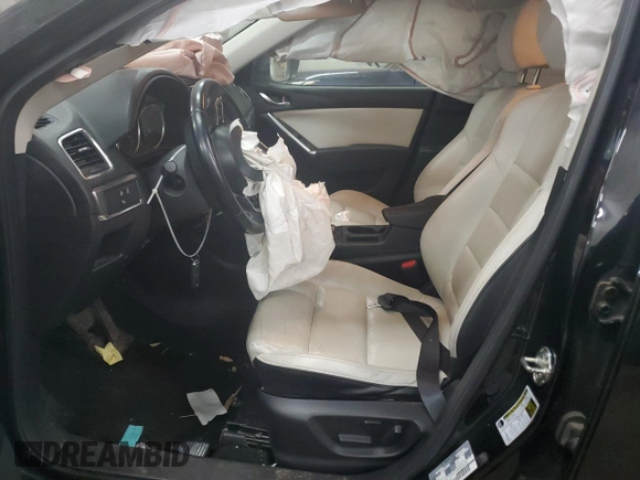 2016 Mazda CX-5 Grand Touring with VIN JM3KE4DY0G0854568, listed as a Copart auction lot 53259345 with 74,264 mi miles and Salvage Title. Bid and sale history available at carsss.com. Image 7.