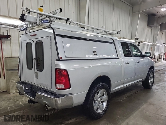 2013 Ram 1500 SLT z VIN 1C6RR7GT8DS695903, wystawiony jako IAAI lot #42557303 z przebiegiem 111 147 mil mil oraz . Historia ofert i sprzedaży dostępna na DreamBid. Obrazek 36.
