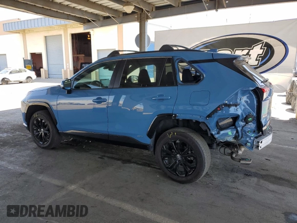 2022 Toyota RAV4 Hybrid SE with VIN 4T3T6RFV7NU103423, listed as a Copart auction lot 59709215 with 27,595 mi miles and Salvage title. Bid and sale history available at DreamBid. Image 2.