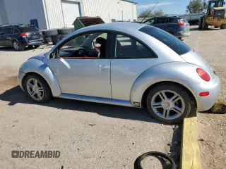 2004 Volkswagen Beetle with VIN 3VWCD31C94M412347, listed as a Copart auction lot 79516144 with 102,542 mi miles and Salvage Title. Bid and sale history available at DreamBid. Image 2.