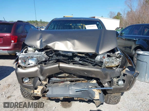 2014 Toyota Tacoma with VIN 5TFLU4EN4EX107161, listed as a IAAI auction lot 41411872 with 134,273 mi miles. Bid and sale history available at carsss.com. Image 12.