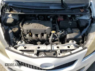 2012 Toyota Yaris L with VIN JTDKTUD30CD527531, listed as a Copart auction lot 65022015 with 157,177 mi miles and Salvage title. Bid and sale history available at DreamBid. Image 11.