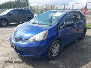2010 Honda Fit with VIN JHMGE8H25AC009358, listed as a IAAI auction lot 41950158 with 162,019 mi miles. Bid and sale history available at carsss.com. Image 2.