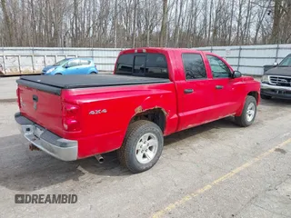 2008 Dodge Dakota SLT z VIN 1D7HW48K88S594342, wystawiony jako IAAI lot #41819673 z przebiegiem 116 134 mil mil oraz . Historia ofert i sprzedaży dostępna na DreamBid. Obrazek 4.