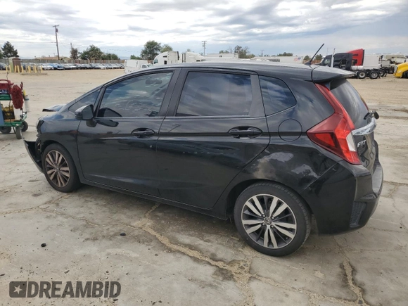 2015 Honda Fit EX-L with VIN 3HGGK5H86FM702976, listed as a Copart auction lot 59439045 with 164,932 mi miles and Salvage title. Bid and sale history available at DreamBid. Image 2.