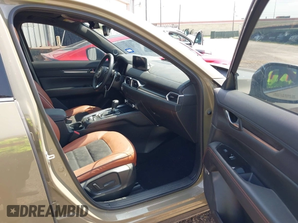 2024 Mazda CX-5 Carbon Edition with VIN JM3KFBAY8R0428460, listed as a IAAI auction lot 41936838 with 11,095 mi miles and . Bid and sale history available at DreamBid. Image 5.