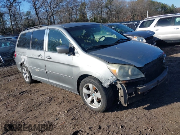 2006 Honda Odyssey TOURING with VIN 5FNRL38846B059685, listed as a IAAI auction lot 41831849 with 999,999 mi miles. Bid and sale history available at carsss.com. Image 1.