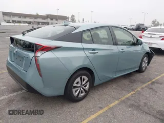 2017 Toyota Prius Two with VIN JTDKARFU7H3052594, listed as a IAAI auction lot 42035969 with 50,789 mi miles and . Bid and sale history available at DreamBid. Image 4.