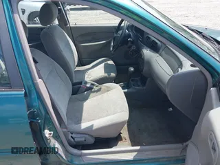 1997 Ford Escort LX with VIN 1FALP13P8VW184766, listed as a IAAI auction lot 40039873 with 104,604 mi miles. Bid and sale history available at carsss.com. Image 5.