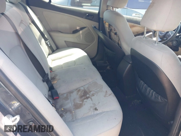 2015 Kia Optima LX with VIN 5XXGM4A77FG440746, listed as a IAAI auction lot 42032775 with 76,494 mi miles. Bid and sale history available at carsss.com. Image 8.