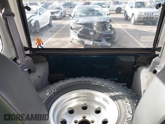 1998 Jeep Wrangler Sport with VIN 1J4FY19S7WP787679, listed as a IAAI auction lot 41764883 with 134,144 mi miles. Bid and sale history available at carsss.com. Image 8.