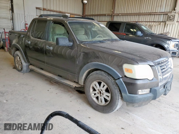 2007 Ford Explorer Sport Trac XLT z VIN 1FMEU31K57UA64013, wystawiony jako Copart lot #57179715 z przebiegiem 268 877 mil mil oraz Czysty tytuł • Clean title. Historia ofert i sprzedaży dostępna na DreamBid. Obrazek 4.