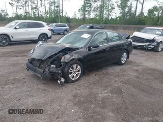 2002 Nissan Altima S z VIN 1N4AL11E02C166764, wystawiony jako IAAI lot #41907063 z przebiegiem Nie podano mil oraz . Historia ofert i sprzedaży dostępna na DreamBid. Obrazek 2.