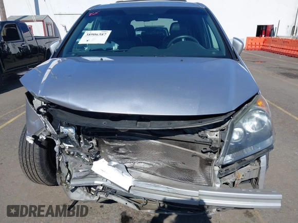 2010 Honda Odyssey EX-L with VIN 5FNRL3H78AB006181, listed as a IAAI auction lot 38906387 with 171,426 mi miles and . Bid and sale history available at DreamBid. Image 6.