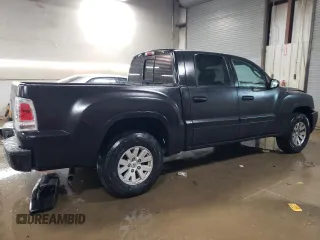 2006 Mitsubishi Raider LS with VIN 1Z7HC28K56S537721, listed as a Copart auction lot 83036764 with 114,576 mi miles and Salvage Title. Bid and sale history available at carsss.com. Image 3.